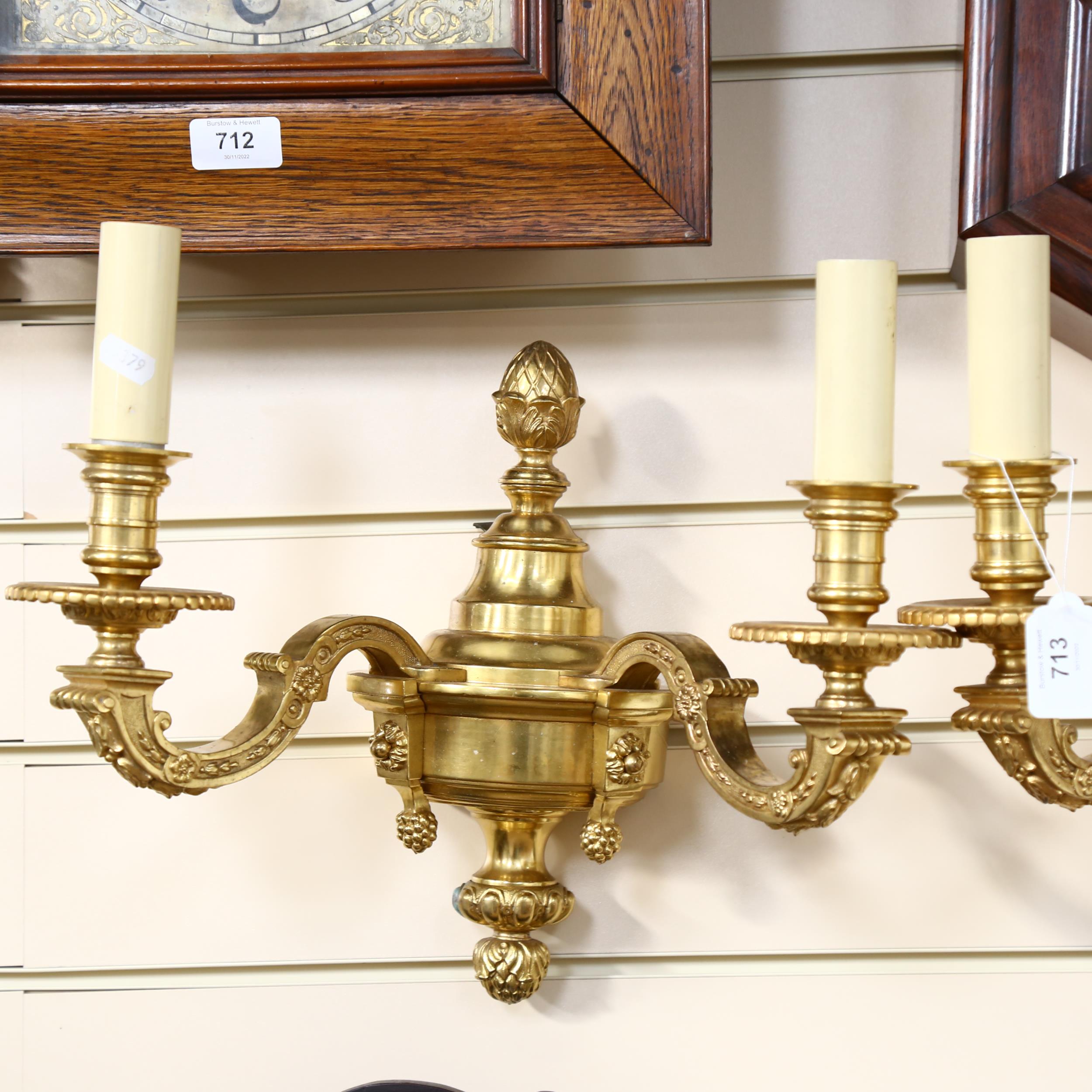 A pair of ornate gilt-brass twin-sconce wall lights, 36cm across - Image 2 of 2