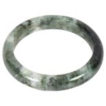 A Chinese green jade bangle, internal diameter 6.5cm, cased