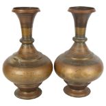 A pair of Antique Persian copper vases, height 38cm