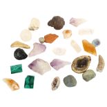 A collection of polished stones and minerals, including amethyst