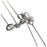 A group of 5 silver-mounted hat pins