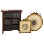 A book case containing an Antique set of miniature Shakespeare, book height 5cm, and 2 portrait