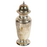 An Edward VII silver sugar caster of stylised form, hallmarks Birmingham 1913, maker's marks William