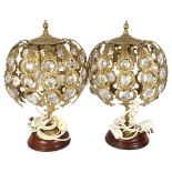 A pair of gilt-metal waterfall design triple-fitted table lamps, height 42cm