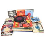 A quantity of vinyl, LPs and 45s, including Frank Zappa, UB40, Wham, The Beatles etc