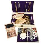 A quantity of modern and other costume jewellery, a silver ring, earrings, brooches etc, in a fitted