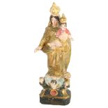 An Antique painted and gilded terracotta Madonna and Child, 30cm