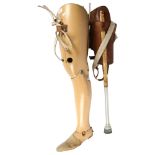 An Antique leather-covered artificial leg, and a Protero artificial jointed leg and foot