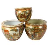 A graduated pair of Chinese jardinieres with floral and pictorial decoration, largest height 24cm,