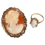 A relief carved cameo brooch, set in a 9ct gold scrolled and pierced mount, and a 9ct gold child's