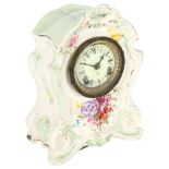 An Edwardian 2-train mantel clock in ceramic case with floral decoration, 17cm