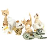 A group of Sylvac cats and dogs, including cat 5298, 17.5cm, a swan, a carved stone cat and an