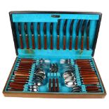 WEBBER & HILL - a canteen of mid-century stainless steel cutlery with teak handles, for 6 people, in