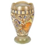 A Bursley ware vase, with tube-lined floral decoration by Charlotte Rhead, height 19cm