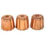 3 small fluted copper jelly moulds, diameter 5.5cm, height 5.cm