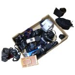 A quantity of various Vintage cameras and accessories, including Canon, Minolta, Polaroid etc