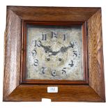 A square oak-cased 2-train wall clock, with engraved dial, 37cm