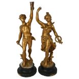 A pair of French gilded spelter figures, Victoire & Glorie after Bruehon, tallest 52cm