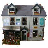 A doll's house titled "George Street", a greengrocer's with living accommodation above, 2 floors