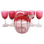 A cranberry overlay crystal decanter and stopper, together with a set of 6 cranberry wine glasses