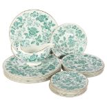 Wedgwood bone china dinner, dessert and side plates, with floral decoration and matching sauceboat