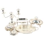 A silver plated 2-branch table candelabra, serving dishes, hors d'oeuvres dish, rollover bacon