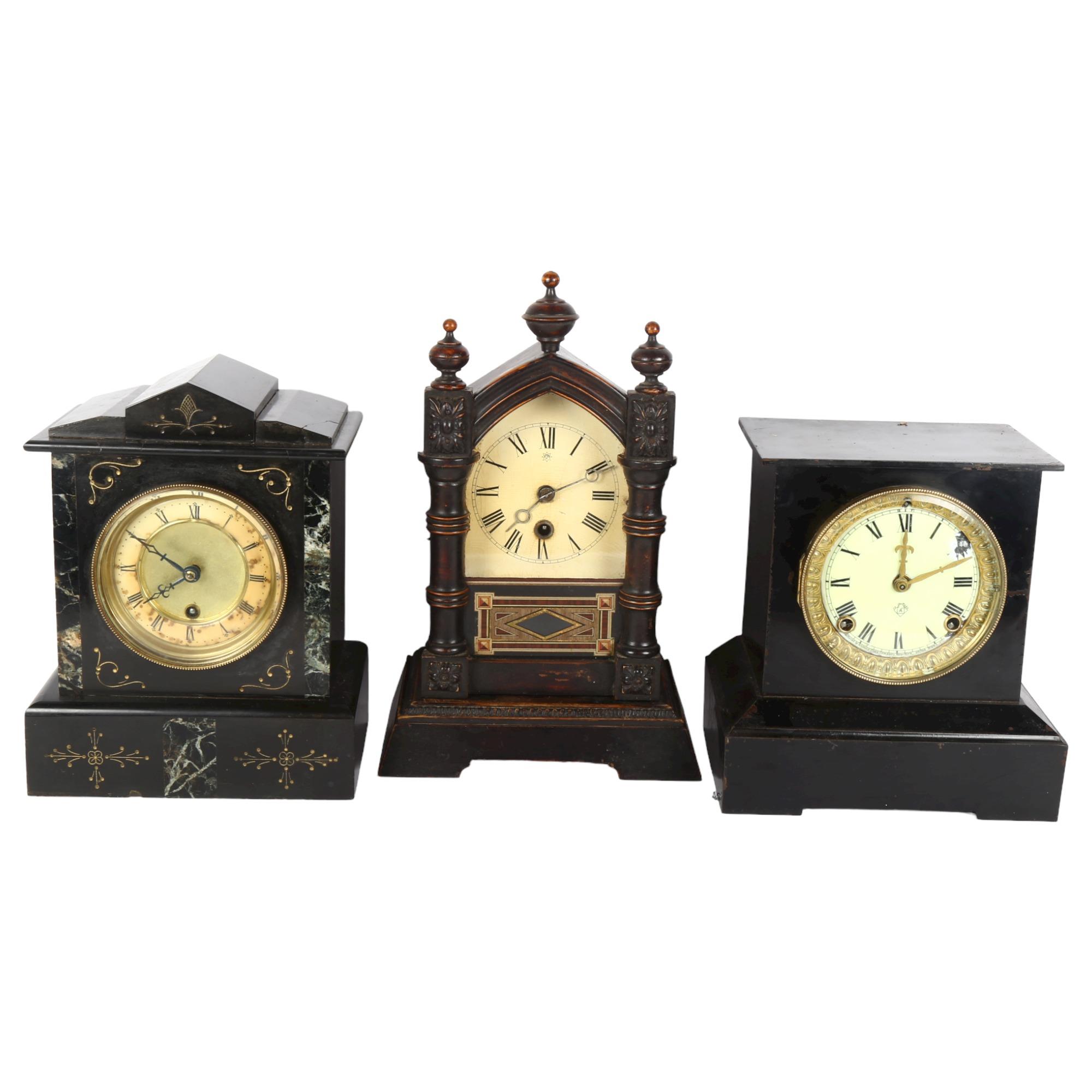 An American Ansonia Clock Company black metal-cased mantel clock, a Victorian black slate mantel