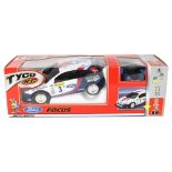 A Tyco remote control Ford Focus toy rally car, boxed