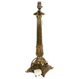 A brass table lamp with acanthus leaf design, height 54cm