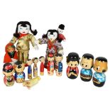 A quantity of Kokeshi and various other Japanese style dolls, largest height 26cm