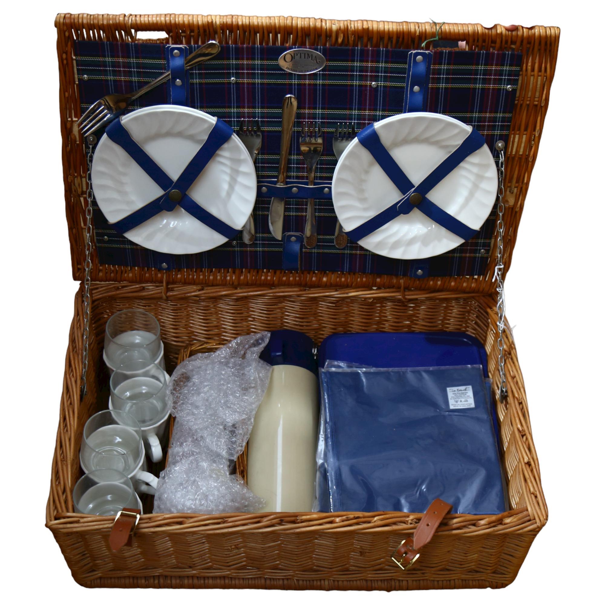 An Optima wicker hamper and contents