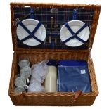 An Optima wicker hamper and contents
