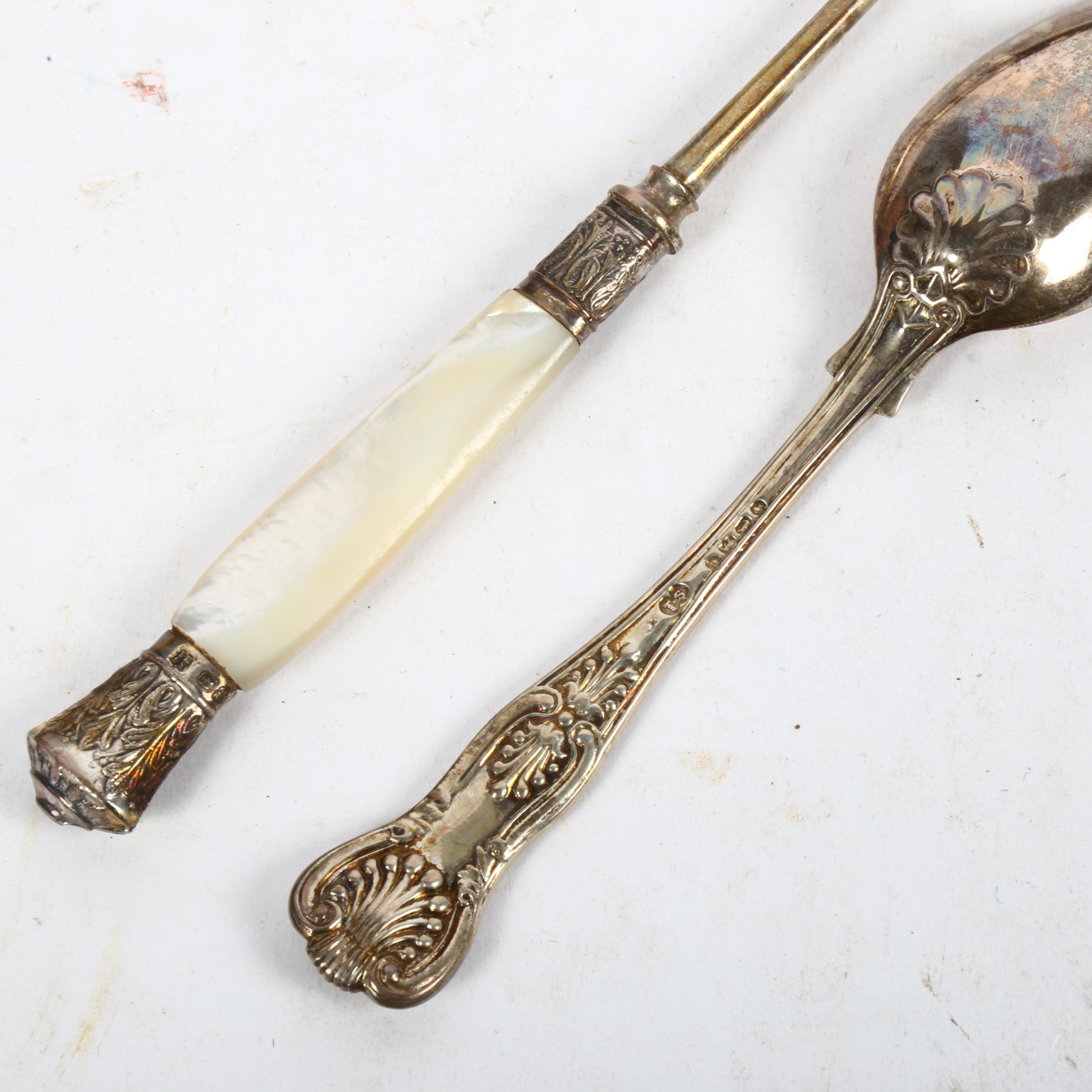 A silver King's pattern design teaspoon, and a silver and mother-of-pearl handled bread fork, length - Image 2 of 2