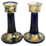 A pair of Jersey pottery candlesticks, height 28.5cm