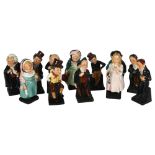 A set of 12 Royal Doulton Dickens figures, tallest Little Nell, 10.5cm
