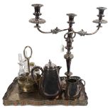 A rectangular silver plated serving tray with raised gallery, a 2-branch table candelabra, condiment