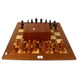 A modern turned wood chess set, complete with 32 pieces and chess board, King height 11cm