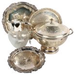 3 circular silver plated serving trays, all with cast edge and scrolled decoration, a large silver