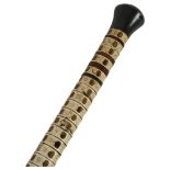 A shark's vertebrae walking cane with horn handle, length 89cm In good overall but obvious used