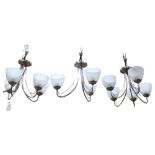 A pair of 5-branch chrome chandeliers, and a pair of 3-branch chrome chandeliers, drop 35cm