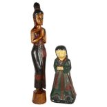 A carved wood Thai deity figure, and a plaster carved kneeling religious figure, largest height 78cm