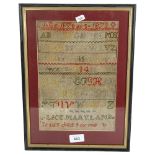 A Victorian sampler by Alice Mary Lamb, dated 1879, framed, height 37cm overall