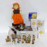 A boxed Hummel doll, and 11 small Hummel and Goebels figures, 4 boxed