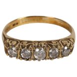 An 18ct gold ring, set with a band of 5 diamonds, size M