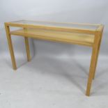 A contemporary light oak 2-tier console table with inset glass top, 130cm x 80cm x 41cm