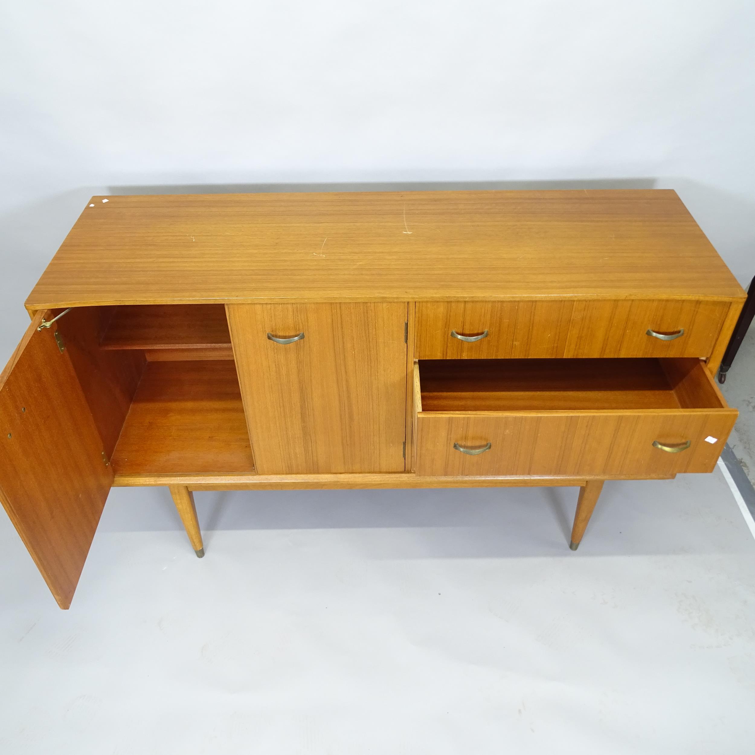 A mid century teak display cabinet with raised mirror back, two adjustable glass shelves and - Image 2 of 2