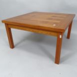 A contemporary teak square top low coffee table, 75cm x 42cm