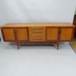 A Mid-century teak G Plan Fresco Long John sideboard by Victor Wilkins, with four fitted drawers and