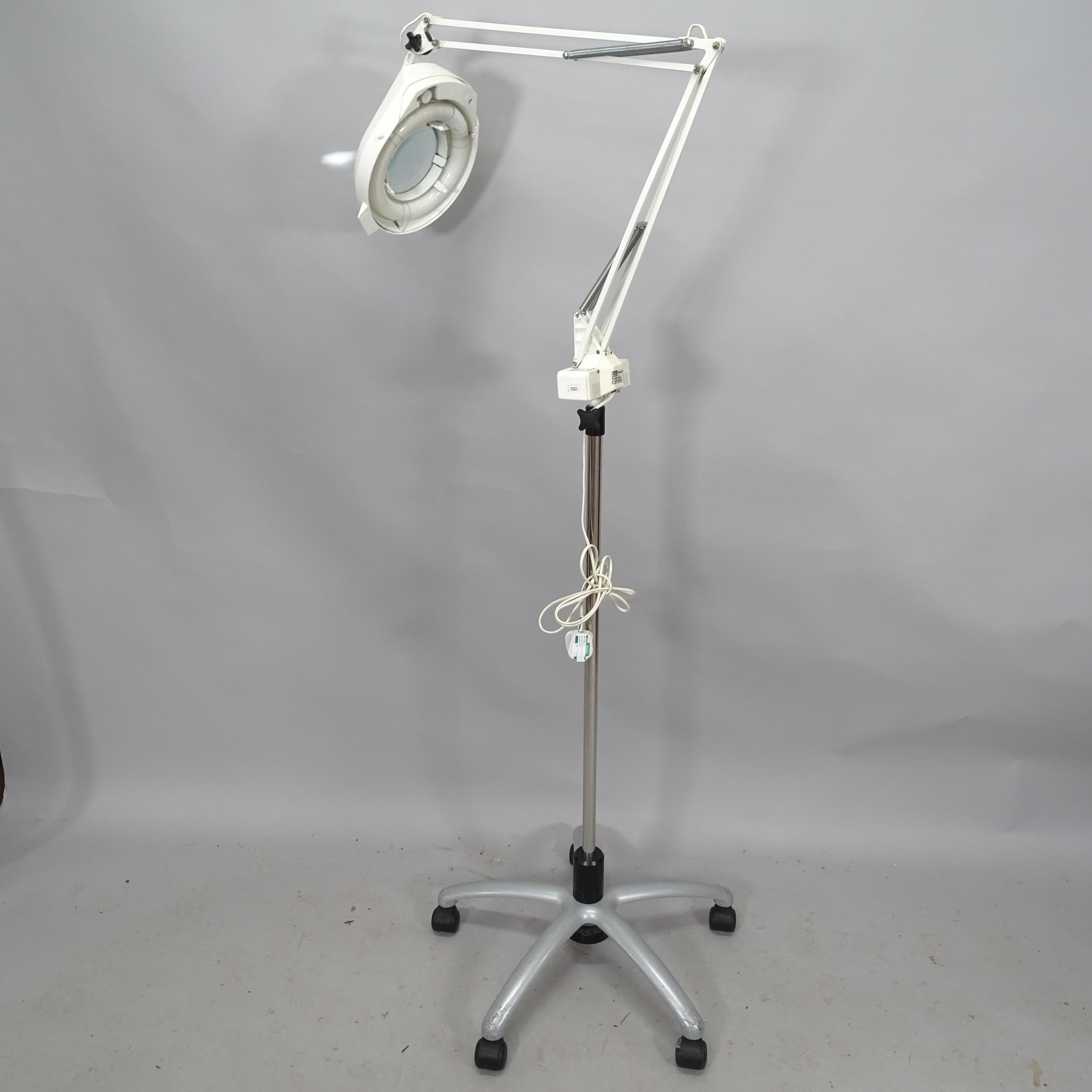 A Ledu 271-2 magnifying standing lamp. Maximum height 230cm