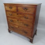 A 19th Century mahogany chest of two short and three long drawers, modified to be in two sections,